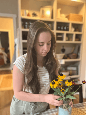 girl arranging flowers