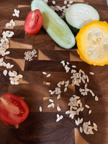 Vegetables and seeds on a cutting board